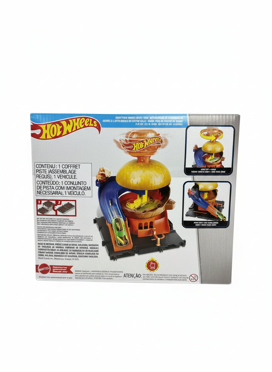 Hot Wheels toy set packaging on a wooden surface