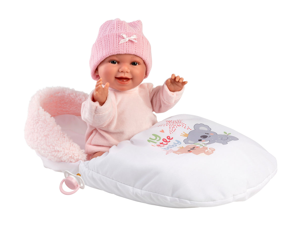 Llorens Willa 15" Soft Body Newborn Doll with Sleeping Bag (LL63806) — sitting on sleeping bag