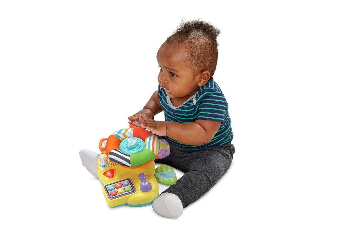VTech Baby Bopping and Cruising Baby Driver (80-567500) - baby playing