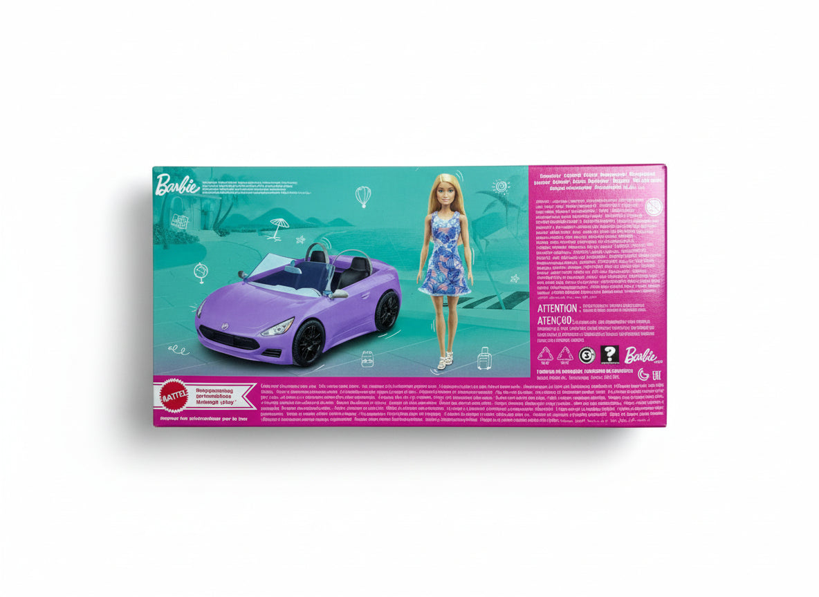 Barbie toy car and doll packaging on a wooden floor