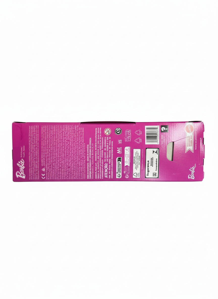 Barbie toy packaging on a gray surface