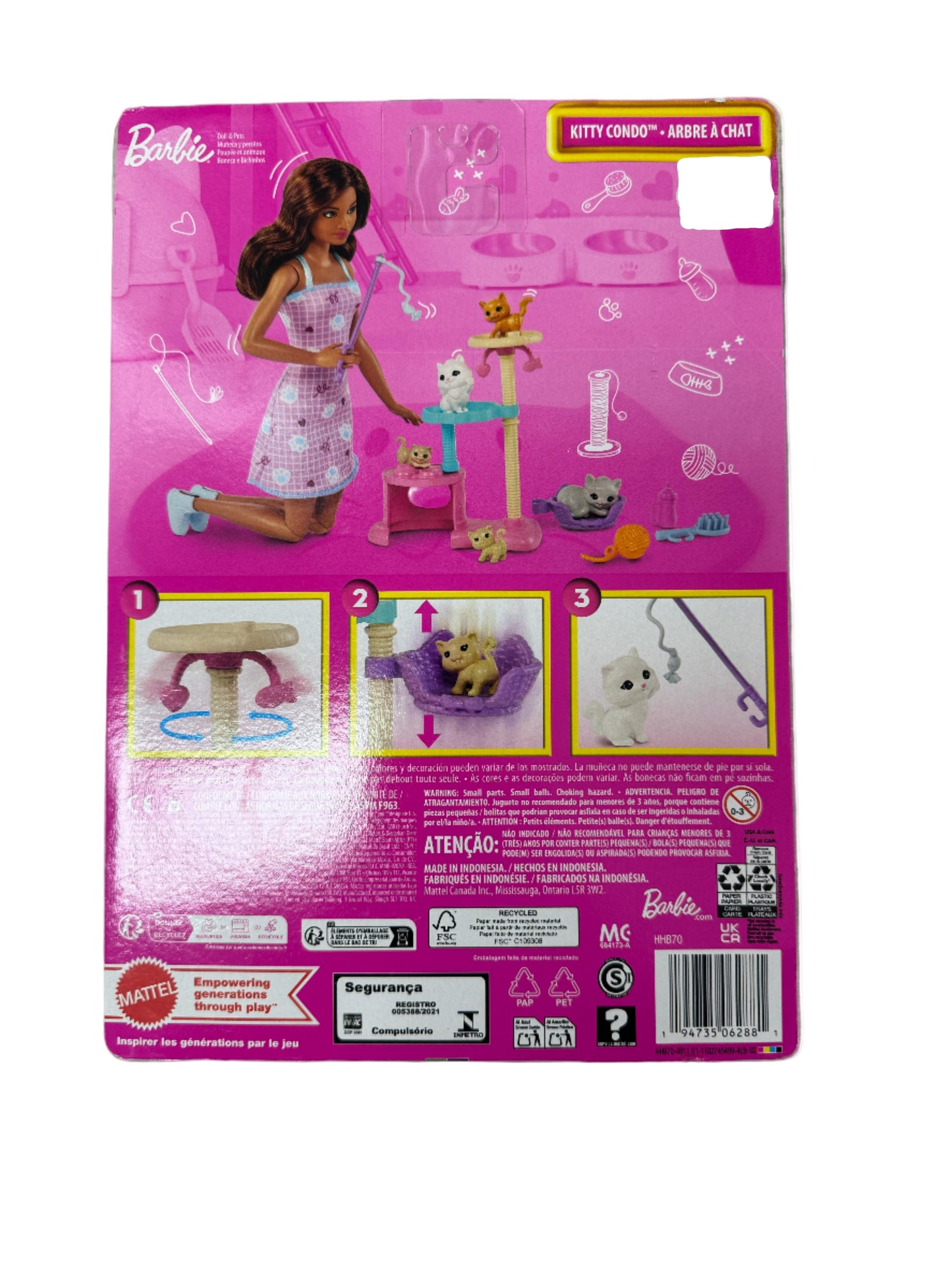 Barbie Kitty Condo toy set packaging on a wooden surface