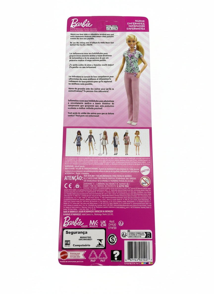 Barbie doll packaging on a wooden surface