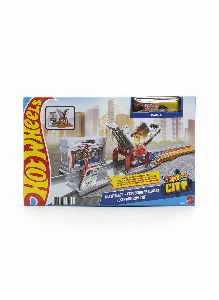 Hot Wheels City Blaze Blast toy set packaging on a wooden floor