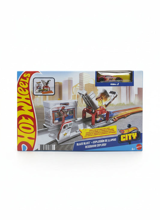 Hot Wheels City Blaze Blast toy set packaging on a wooden floor
