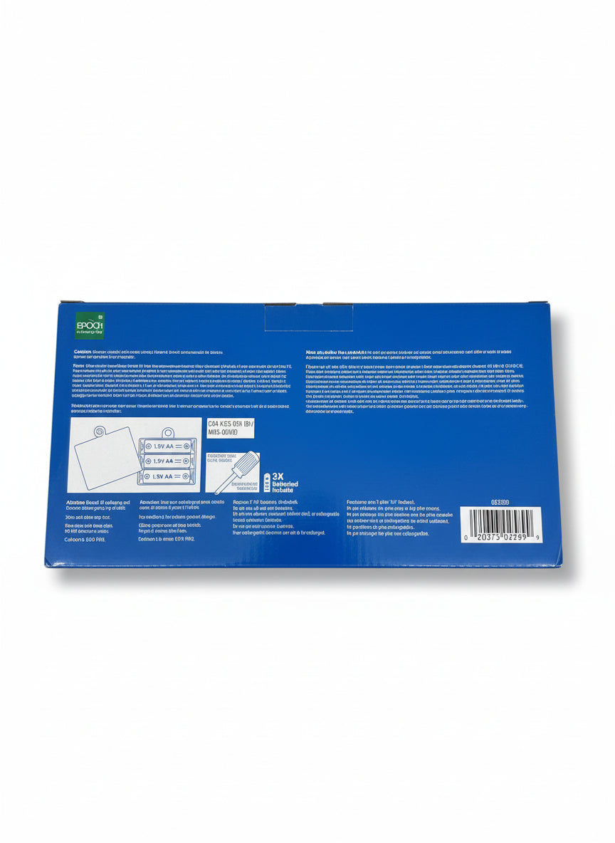 Blue box with text and a barcode on a gray surface