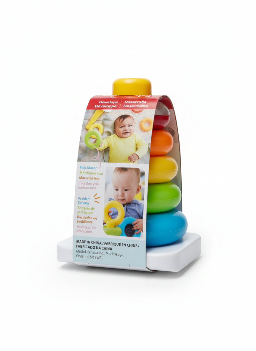 Colorful baby toy with packaging on a wooden floor
