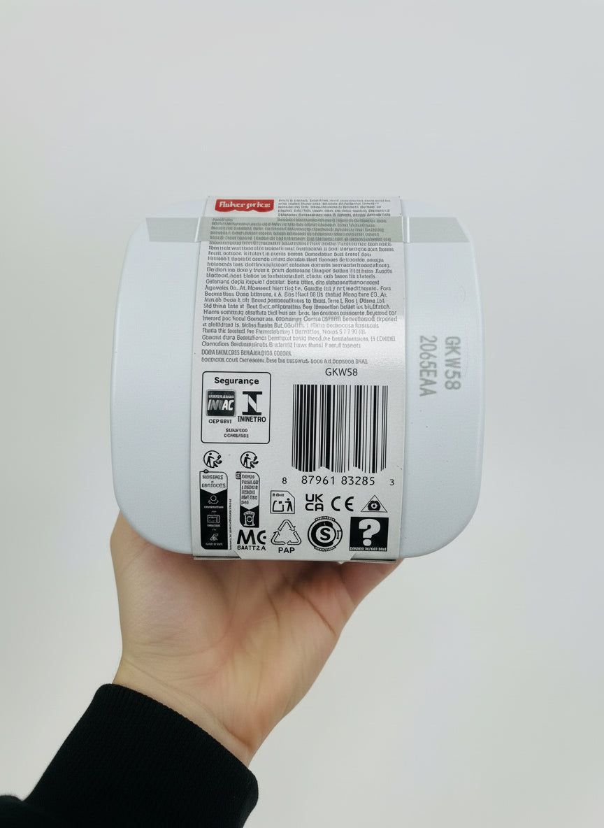 Product packaging with visible branding and text on a wooden surface