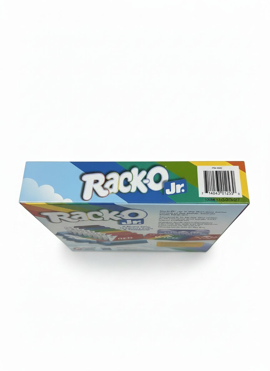 Box of Rack-O Jr on a light gray surface with a blurred background