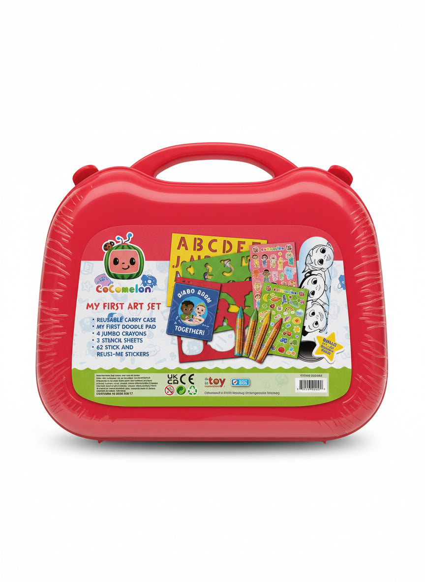 Red art kit packaging with colorful labels on a light wooden surface