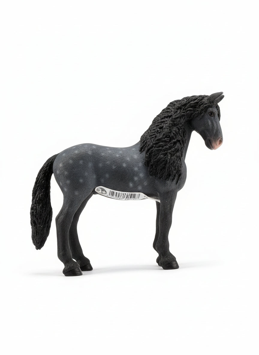 Horse figurine with a barcode label on a wooden floor