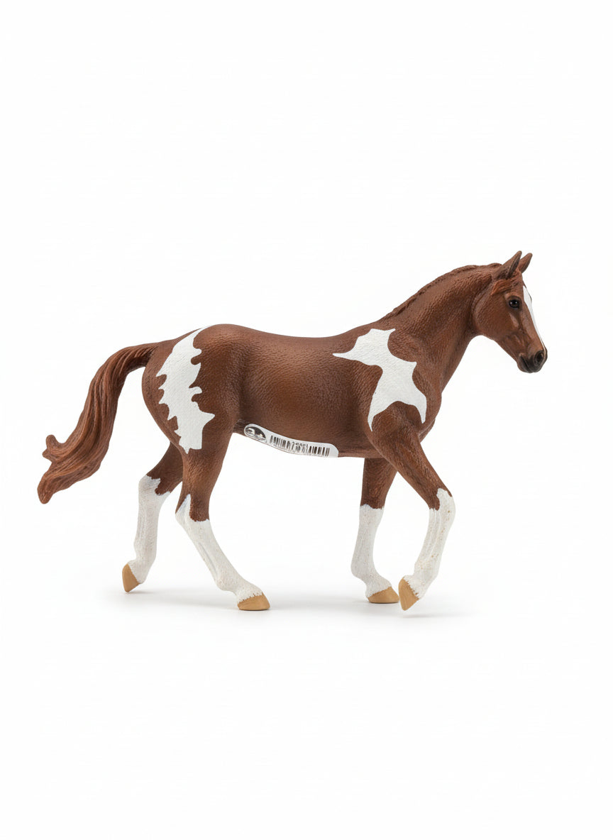 Model horse on a wooden floor