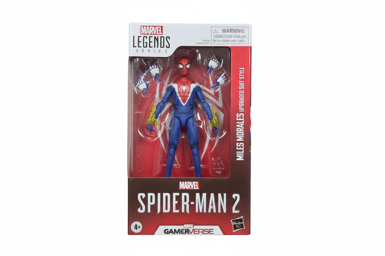 Marvel Legends Spider-Man action figure in packaging on a wooden surface